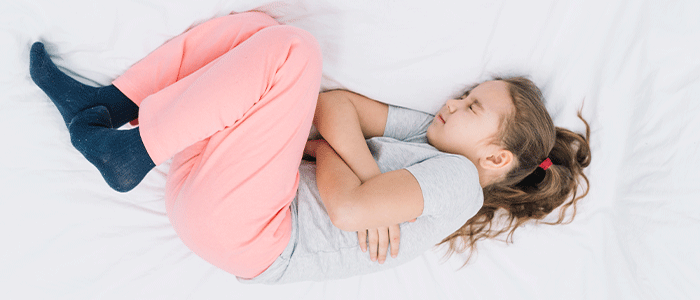 Stomach pain in kids: causes and natural home remedies